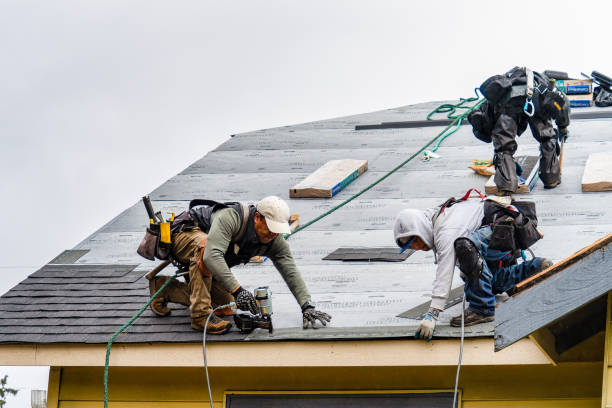 Professional Roofing technician working in East Wareham, MA